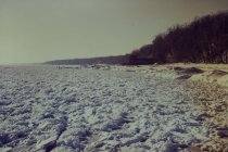 View south along the beach in winter